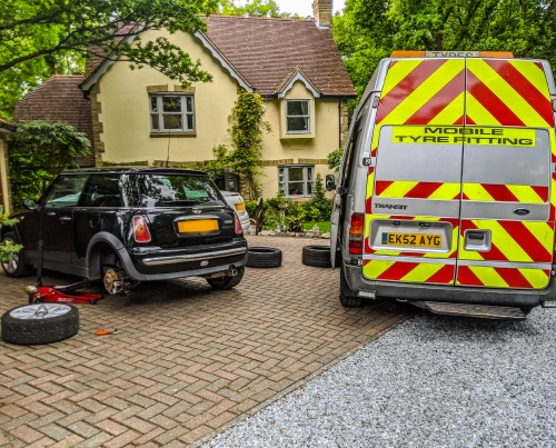 Man fitting tyre