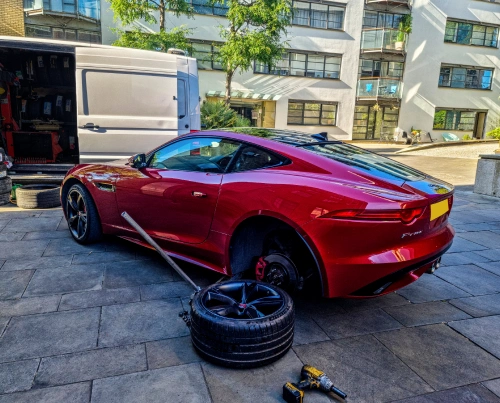Man fixing tyre
